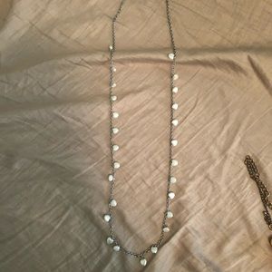 Long chain pearl necklace